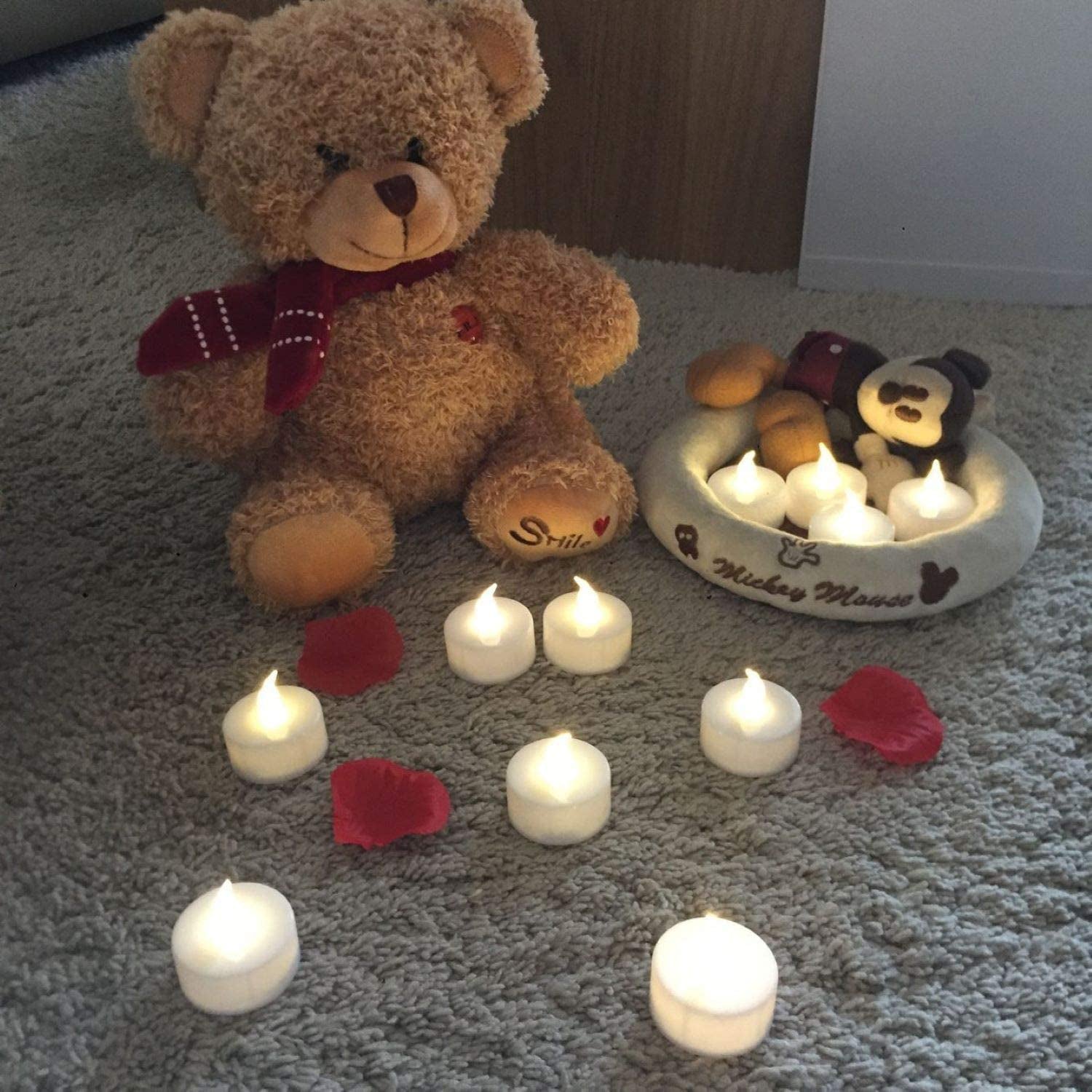 Flameless Tea Lights Candles - Realistic LED Flickering Operated Tea Lights Steady Battery Tealights Long Lasting Electric Fake Candles in White 24Pcs Decoration for Party and Gifts Ideas